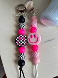 Pink Smiley Paci Clip