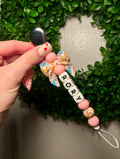 Pooh Bow Paci Teething Clip