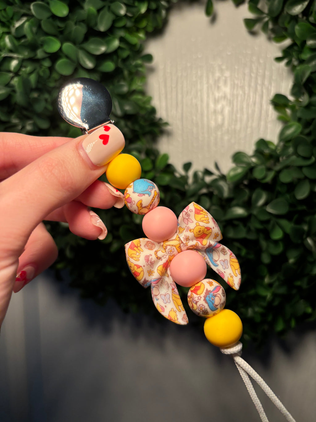 Pooh Bow Paci Teething Clip