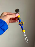 Game Day Paw Print Paci Clip
